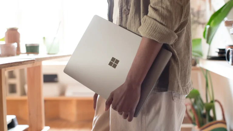 Workspace setup with a Microsoft device, supporting global campaign strategies.